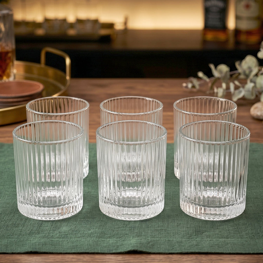 Complete set of six stylish crystal glass tumblers for serving