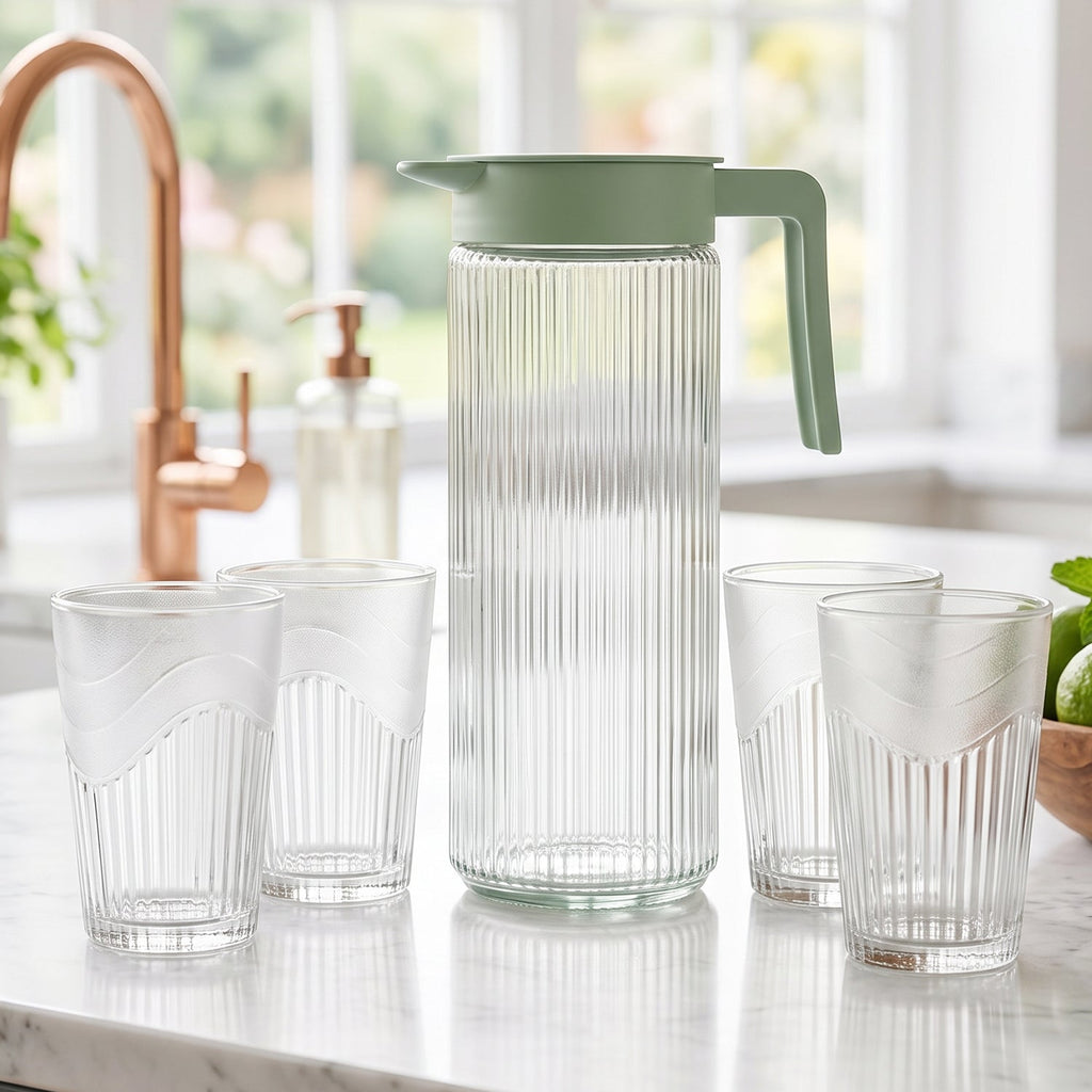 Glass jug pouring water view