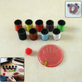 Portable sewing kit with colorful thread spools and needles for quick repairs