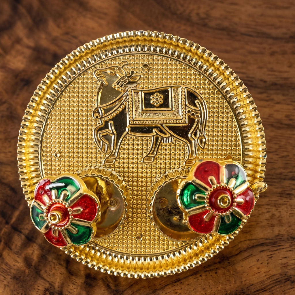 Ornate cow shaped kumkum holder for festivals and worship
