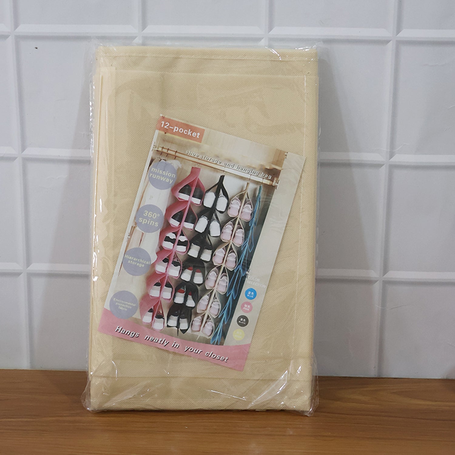 Space-saving hanging shoe organizer bag hanging in wardrobe