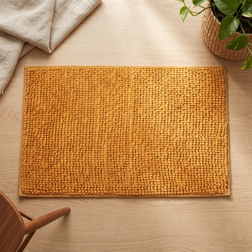 Soft absorbent mat for bathrooms, kitchens and halls