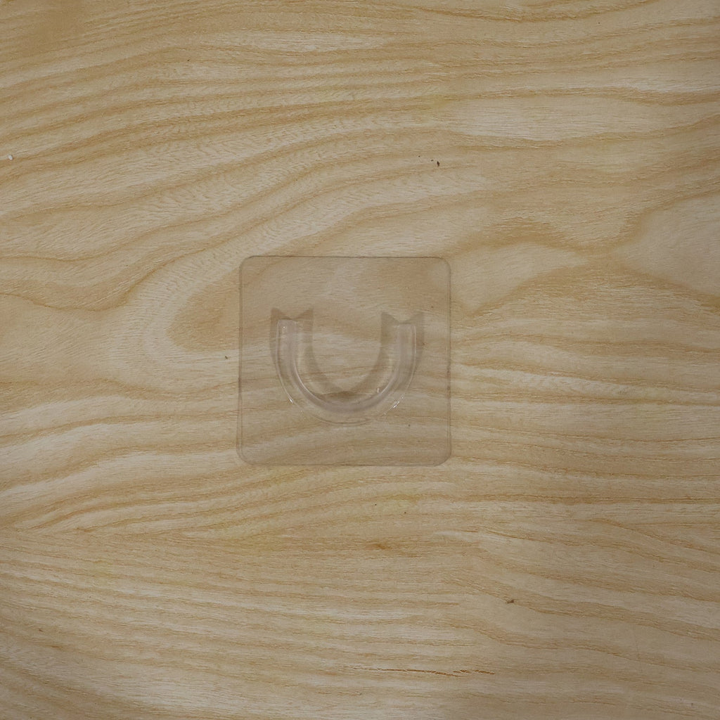 Durable adhesive wall hook for versatile home organization