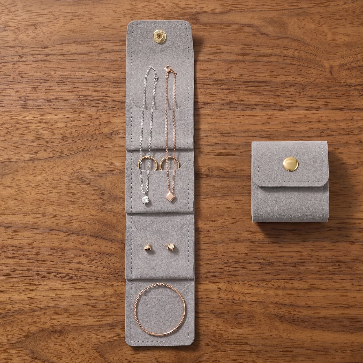 Soft travel jewellery bag with compartments and tie closure