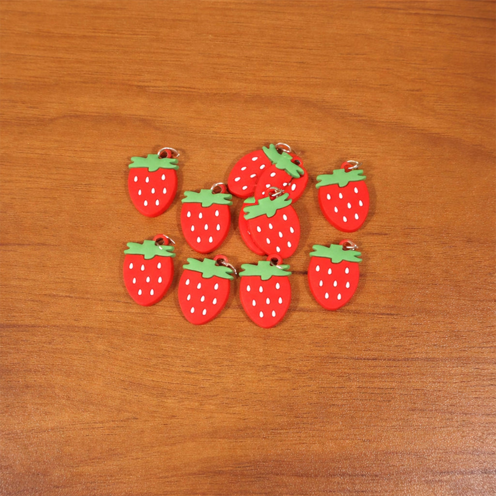 Colorful set of strawberry-themed keychain accessories
