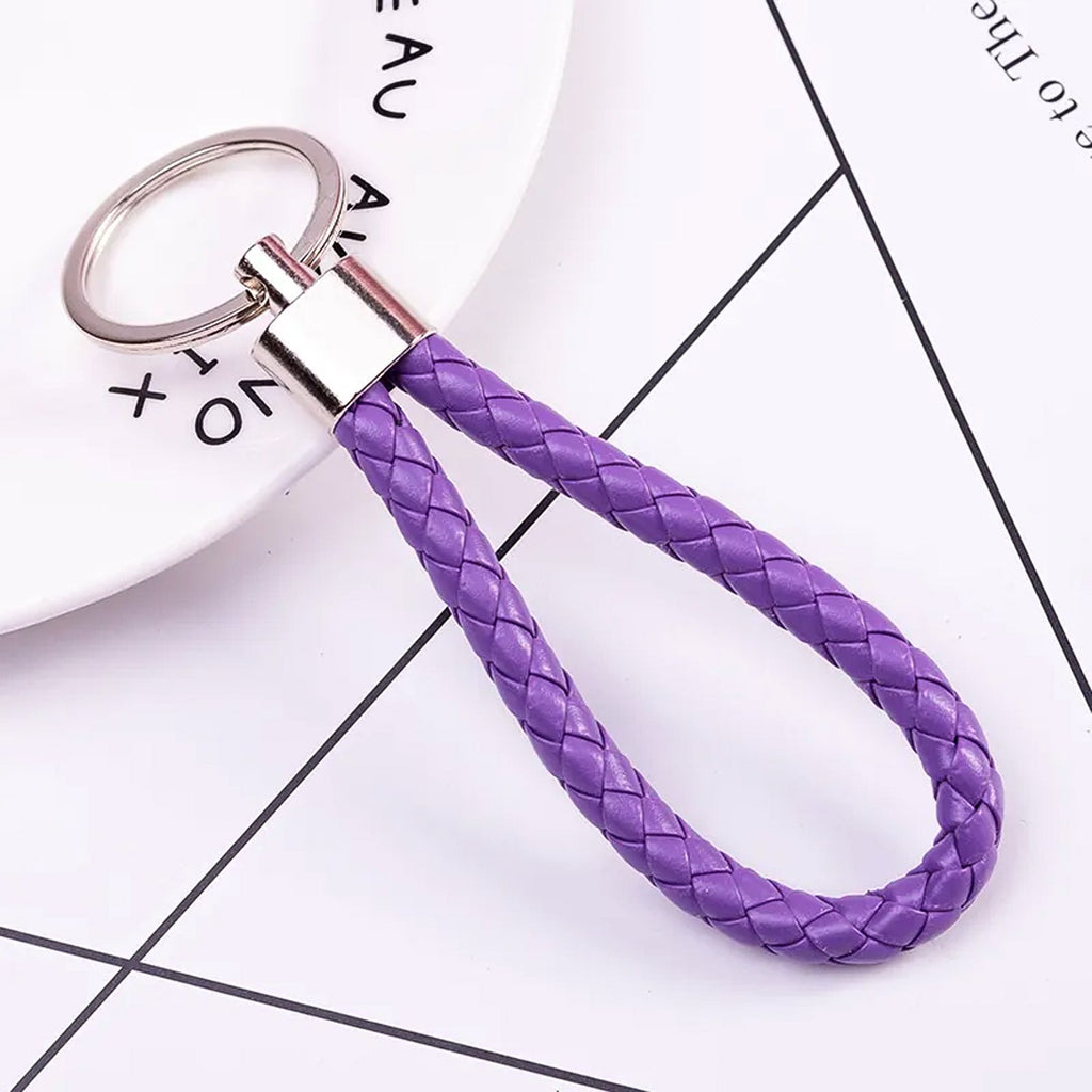 Close-up view of the braided texture and metal ring of the keychain