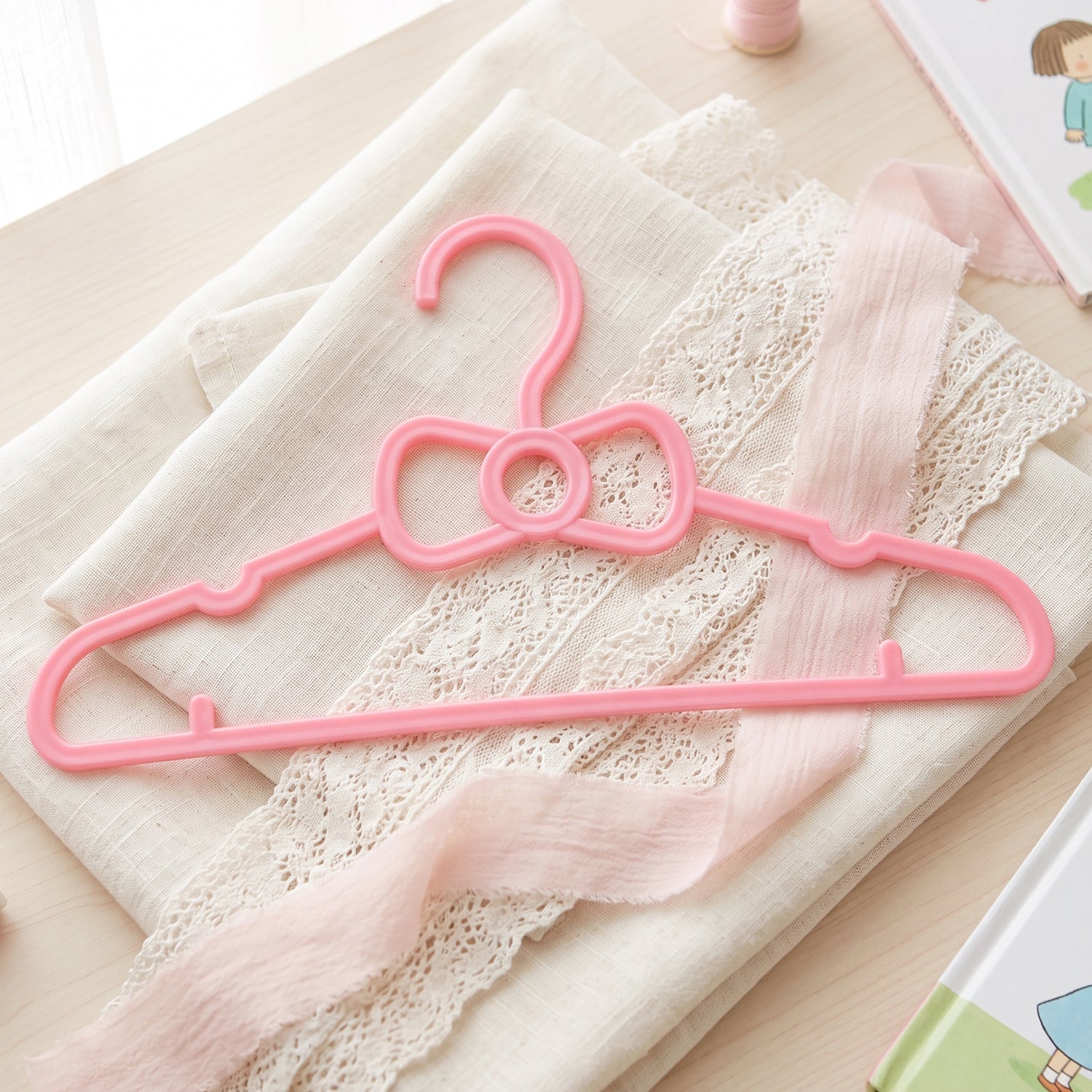 Children's wardrobe hangers with fun design for small garments
