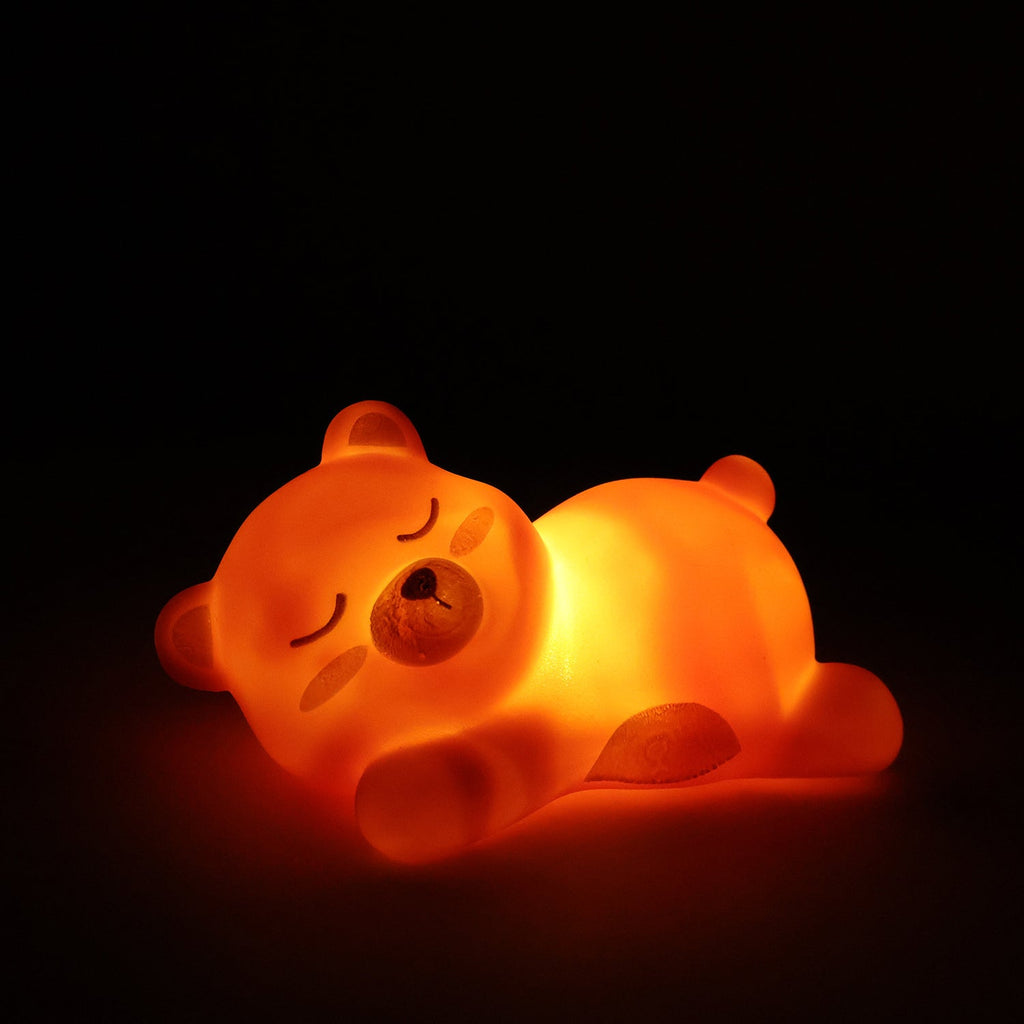 Sleeping bear night light, a portable and safe bedside companion for kids.