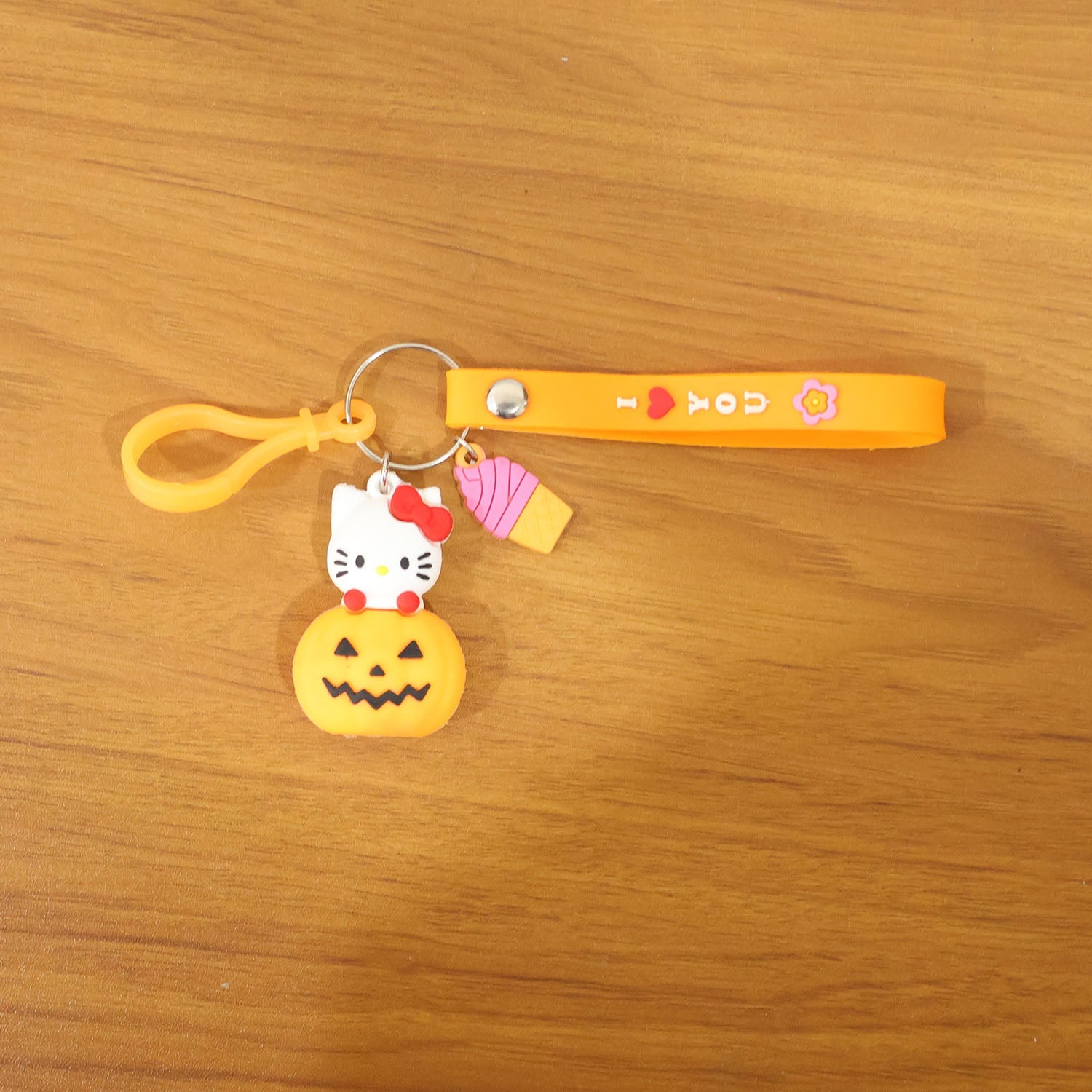 Stylish kitty pumpkin accessory as keychain or bag charm keychains