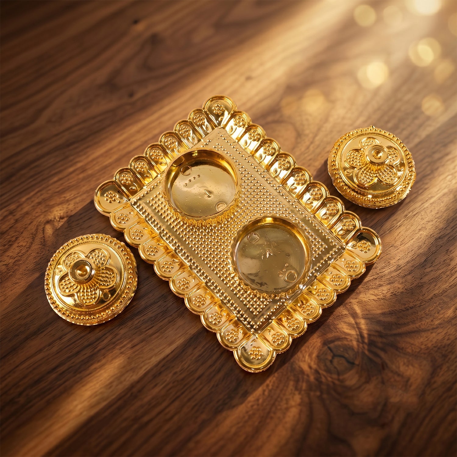 Golden floral kumkum holder detail