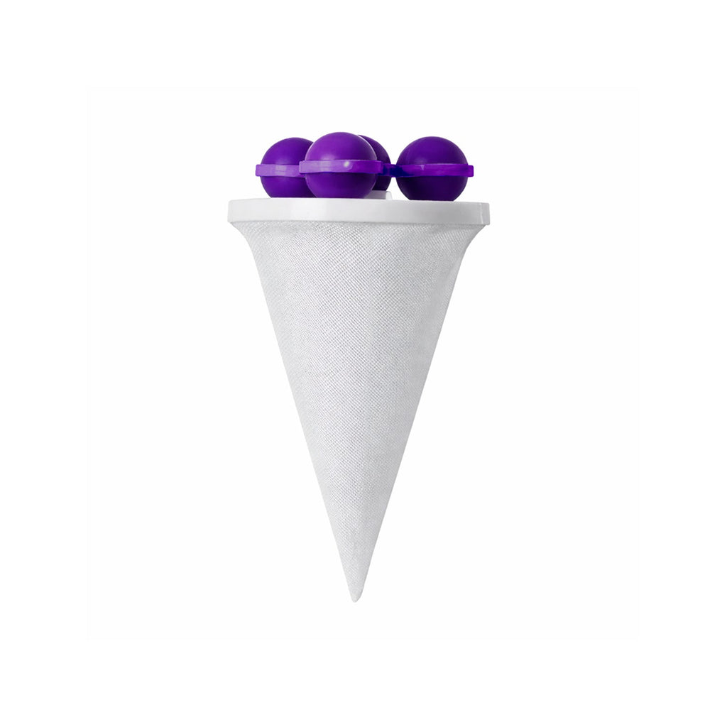 Laundry lint catcher ball positioned in washing machine