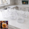 Stylish 6-piece transparent glass drinking set with elegant ribbed design.
