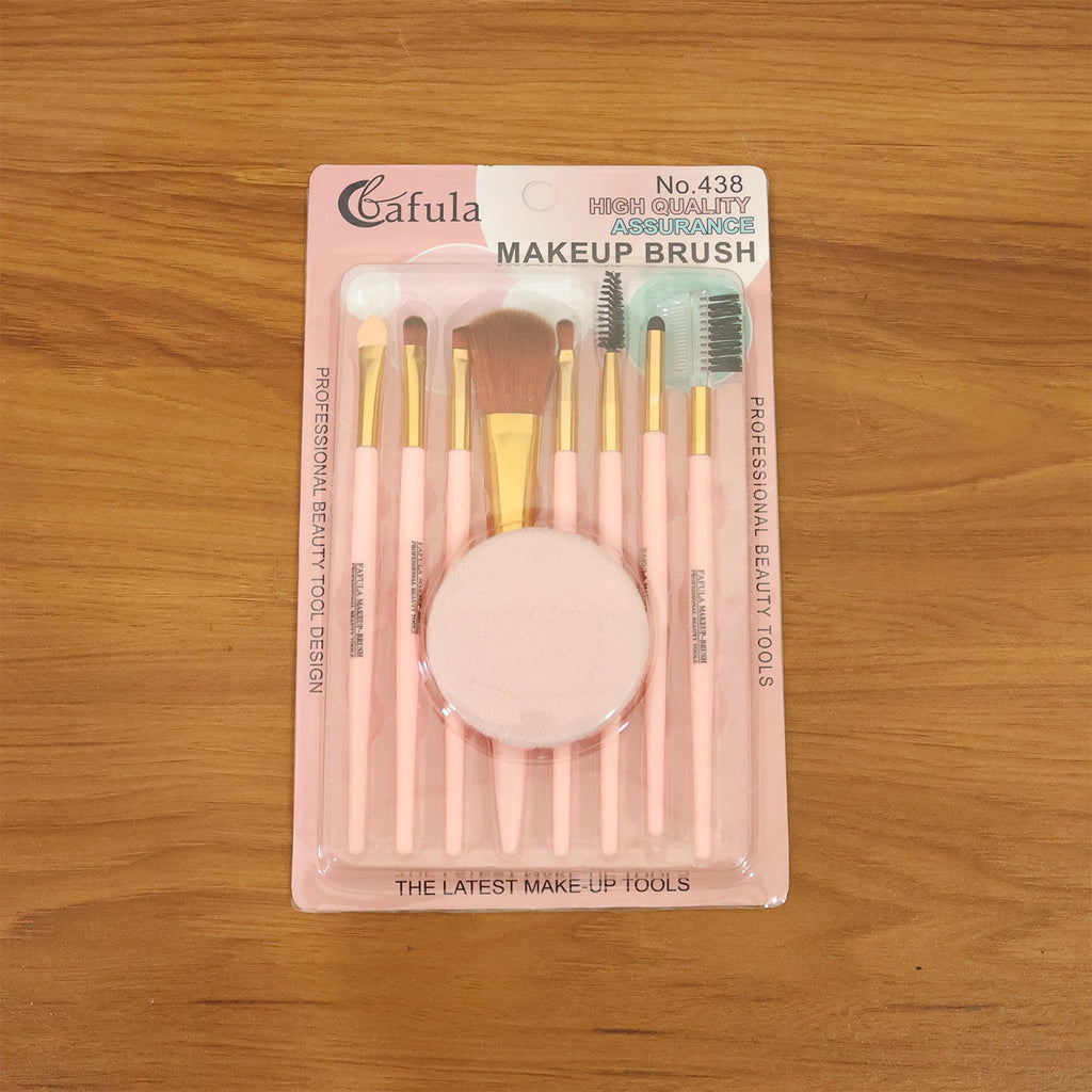 All 9 makeup brushes and puff laid out for easy access during makeup