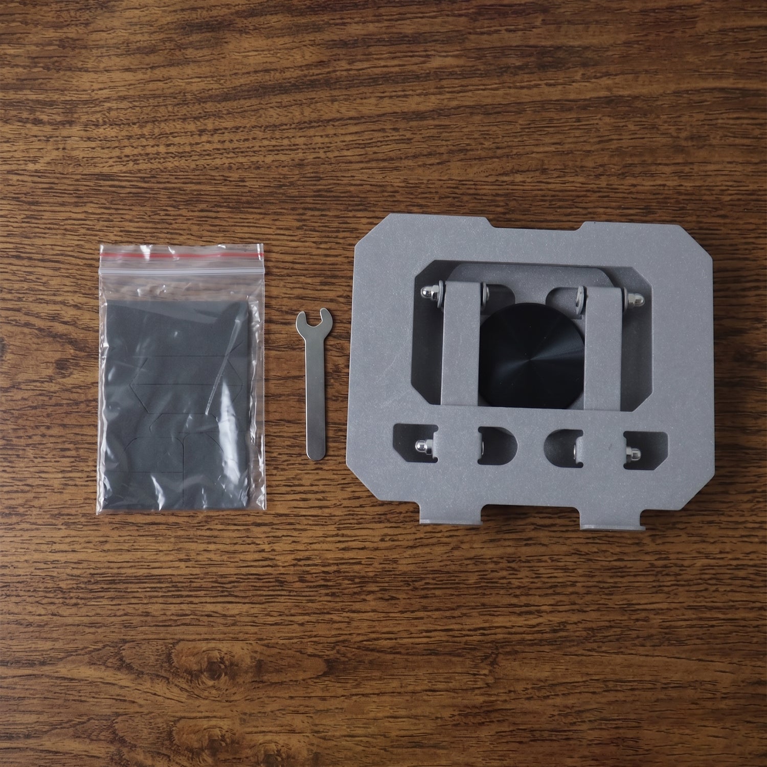 Smartphone on foldable metal stand on desk