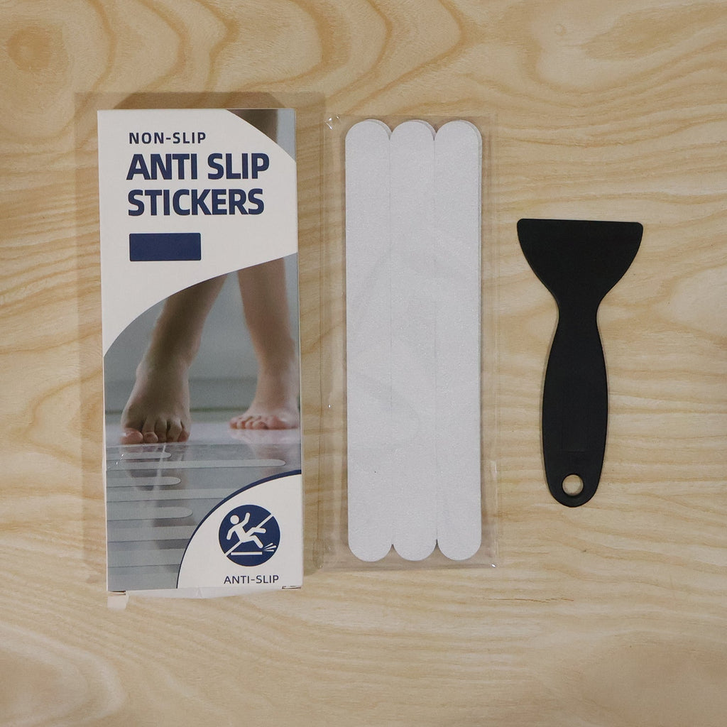 Application of anti-slip strips on bathroom floor for safety
