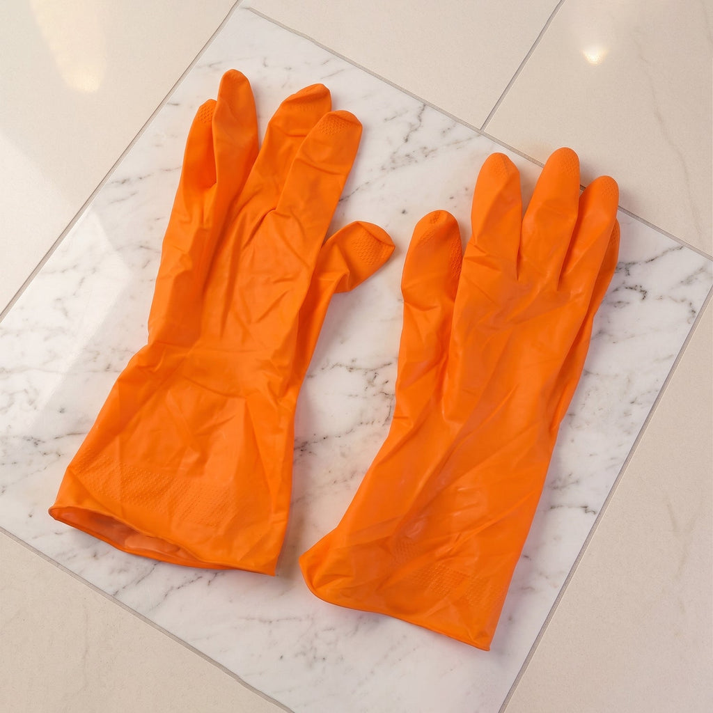 Orange household cleaning gloves for daily chores