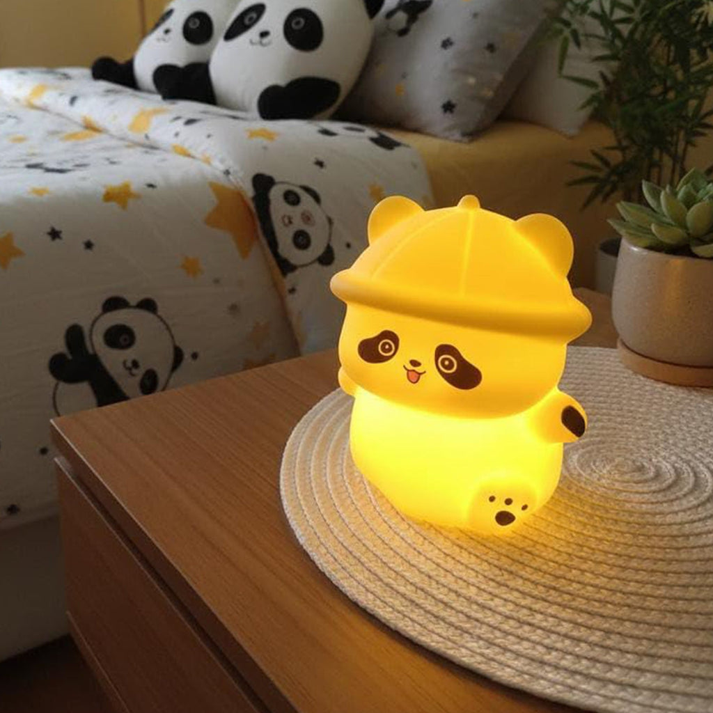 Squeezable silicone panda LED lamp with hat for bedtime light