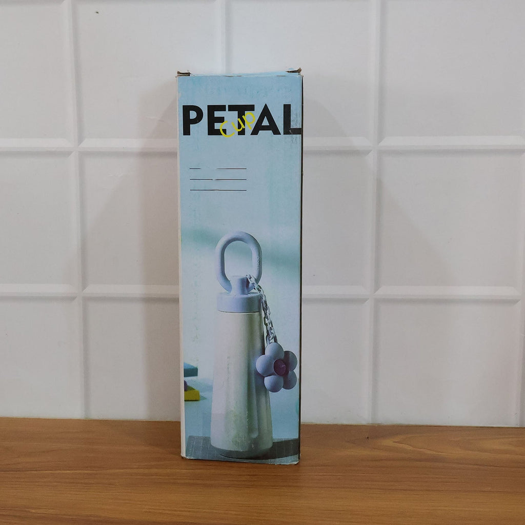 450ML portable water bottle placed in a natural outdoor setting