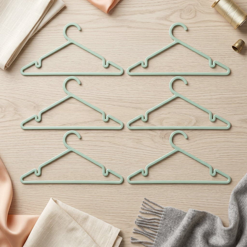 Close-up of durable plastic garment hanger with non-slip grip