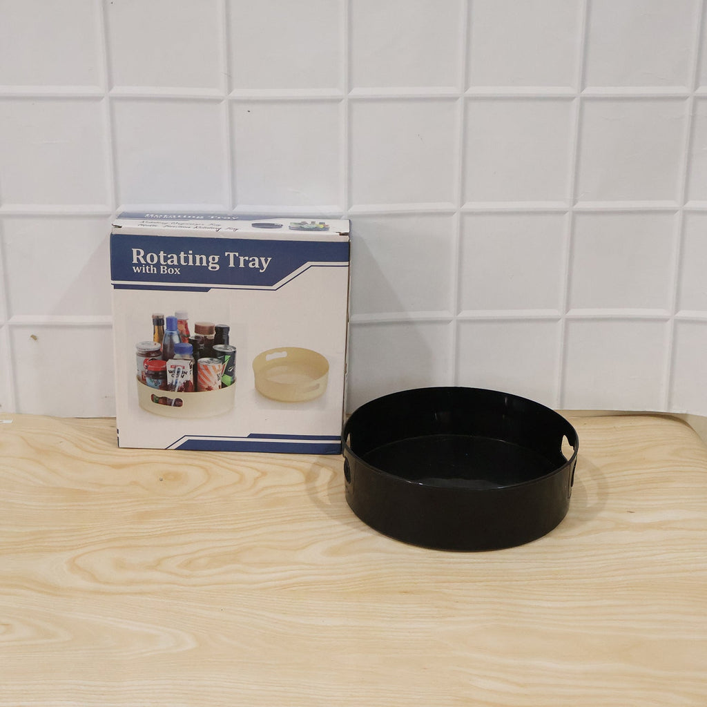 Everyday use of the rotating storage tray for kitchen essentials.