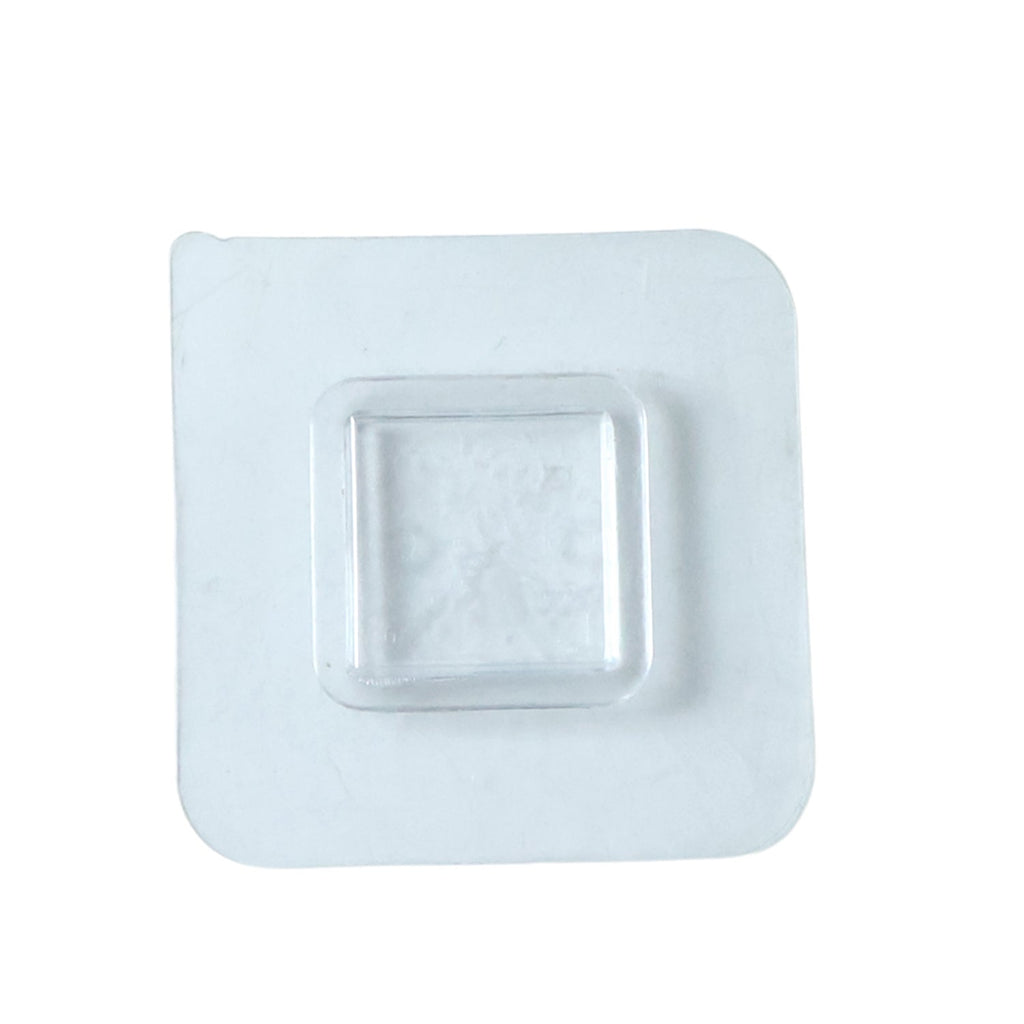 Transparent no-drill wall hook demonstrating versatile use in a home setting.