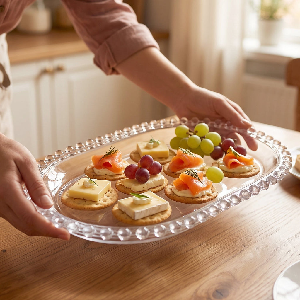 Crystal clear glass platter with beaded rim for table serving