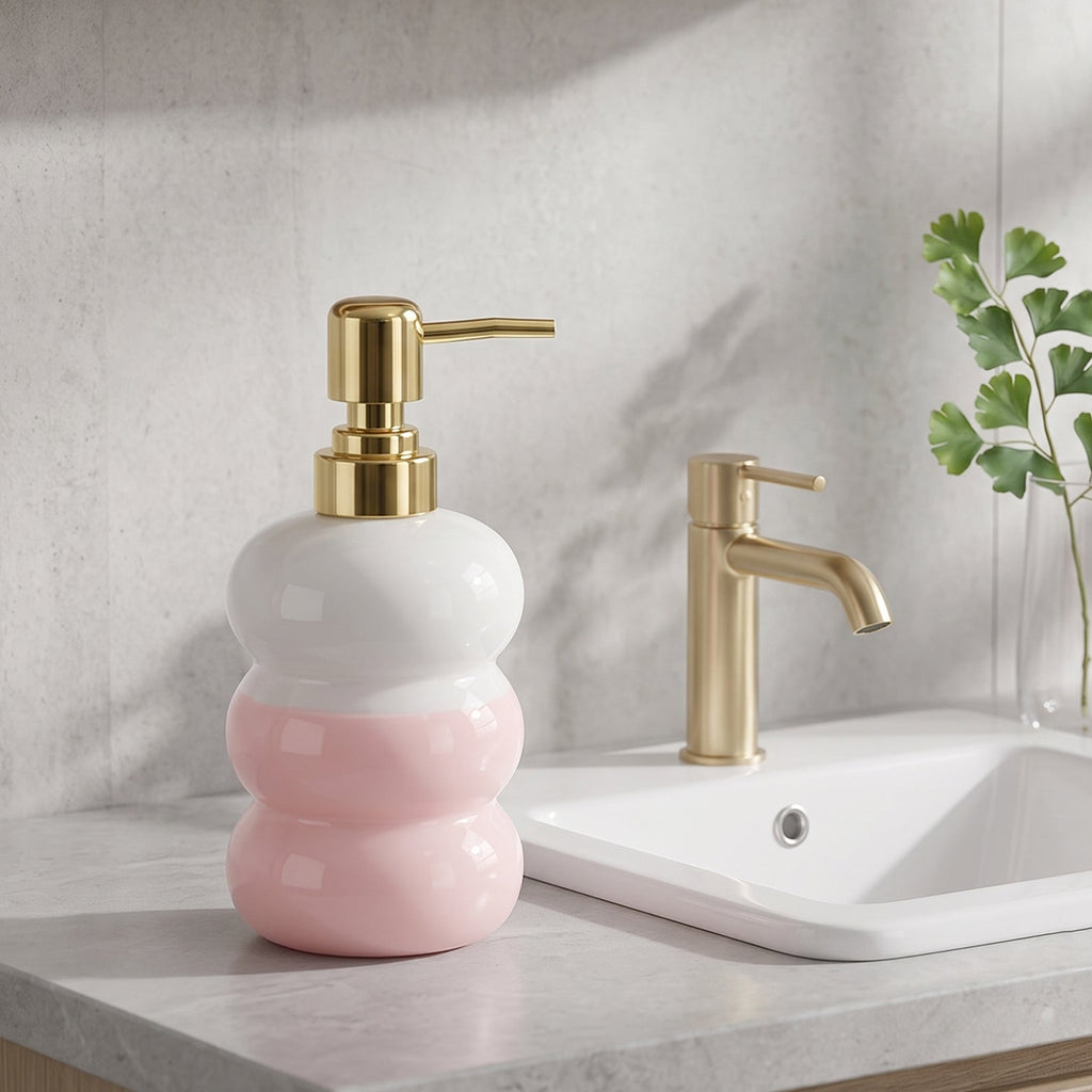 Countertop soap pump bottle in glass with gold accent
