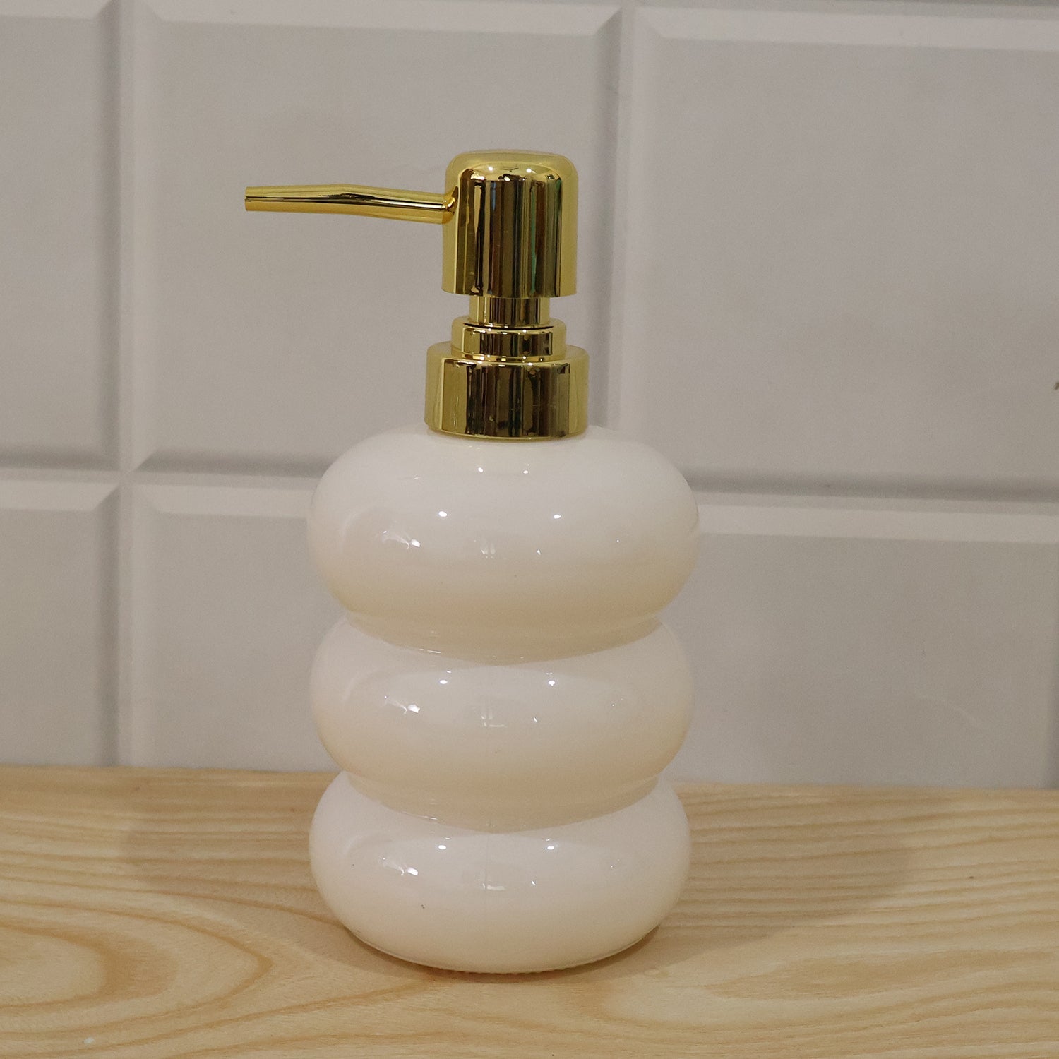 Decorative glass soap dispenser for modern bathrooms