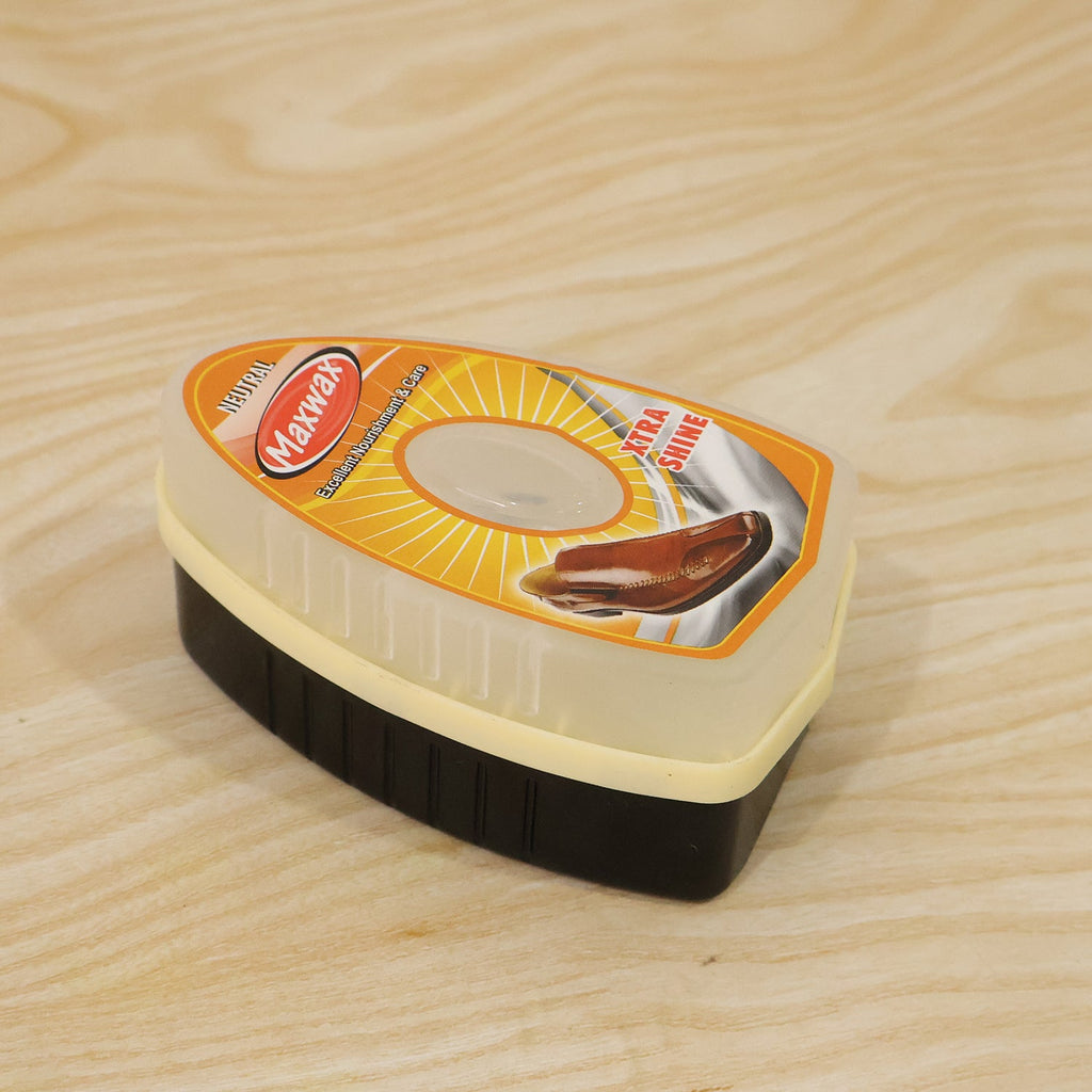 Maxwax neutral instant shoe shiner providing a quick shine on a leather shoe.