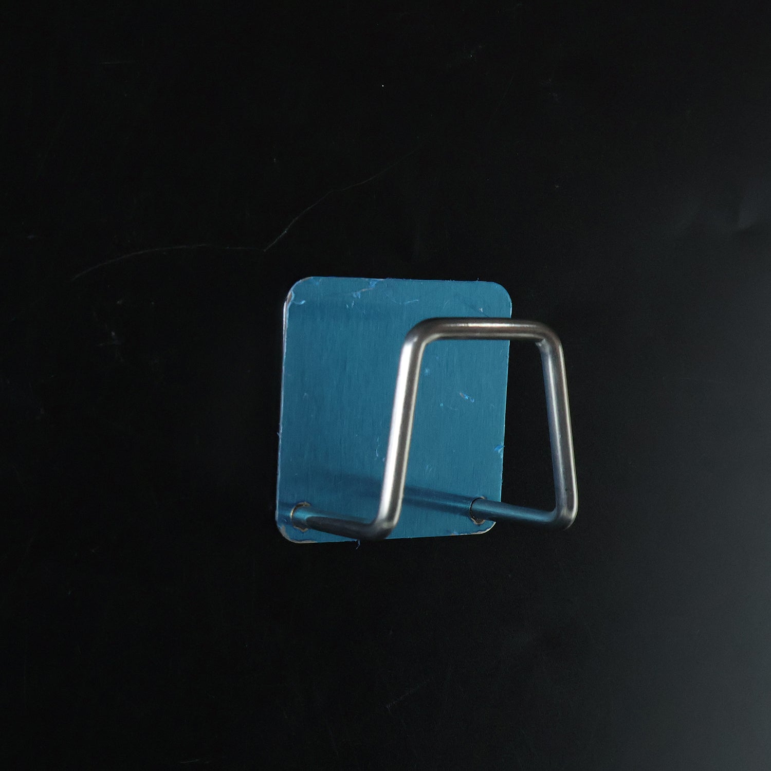 Strong hold stainless steel adhesive wall hook in use