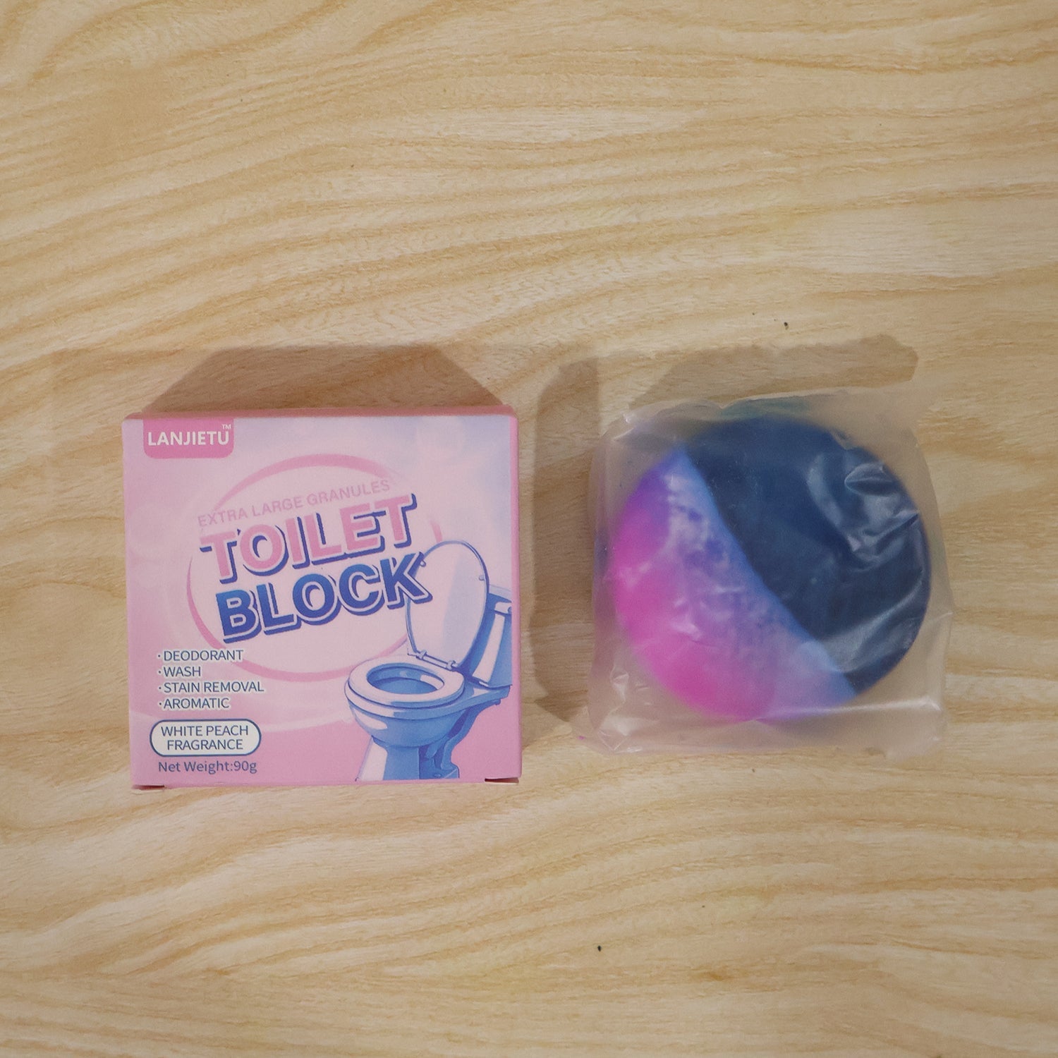 Blue flush toilet cleaner block with refreshing white peach scent.