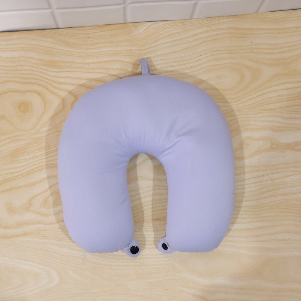 Cosy travel pillow with snap button for comfortable rest