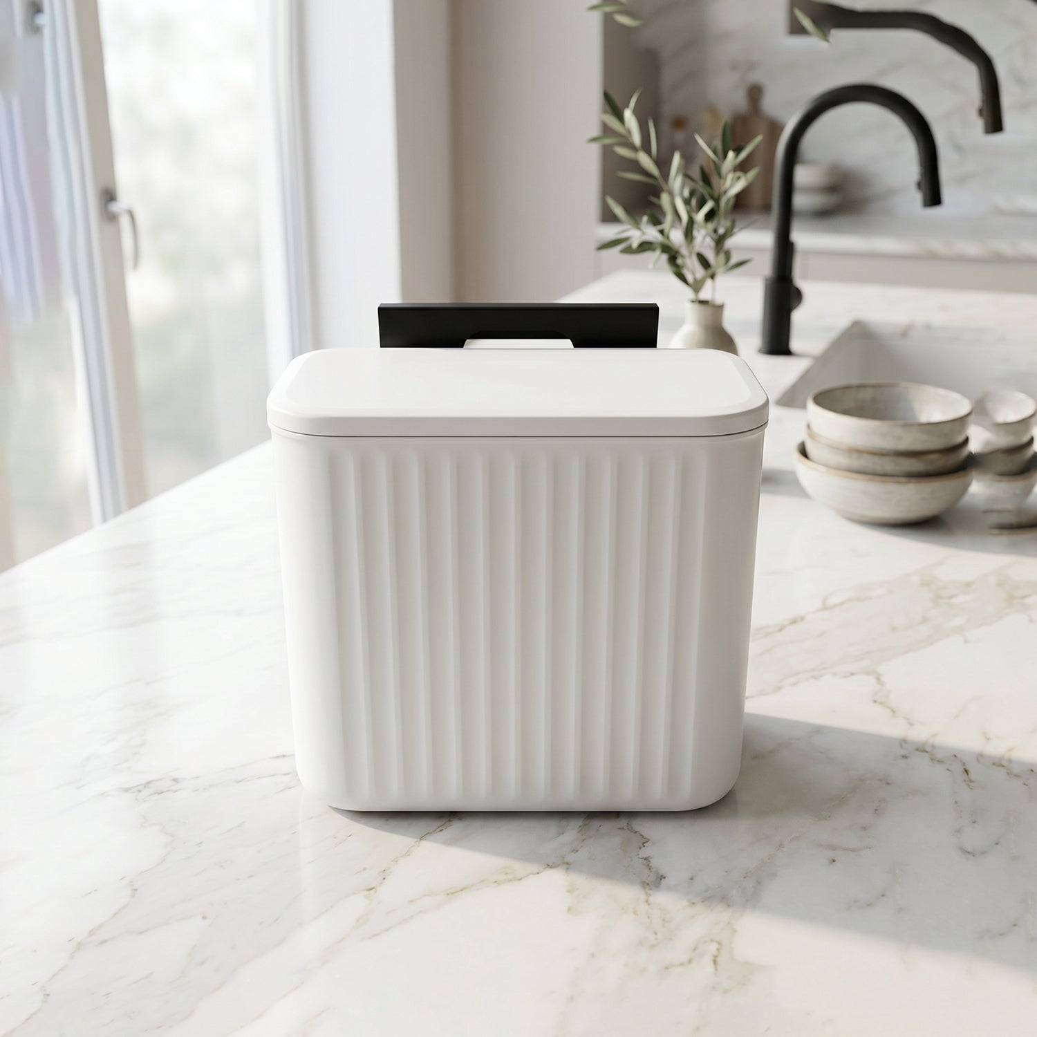 Side view of small kitchen waste bin