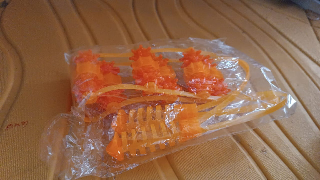 Velvet Wellness compact back massage roller rope in its packaging