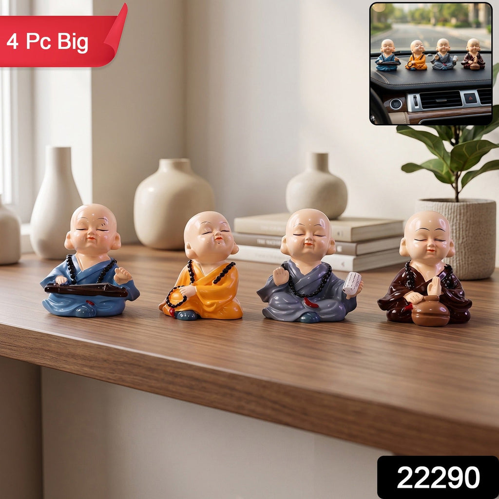 Four little monk figurines in different meditation poses