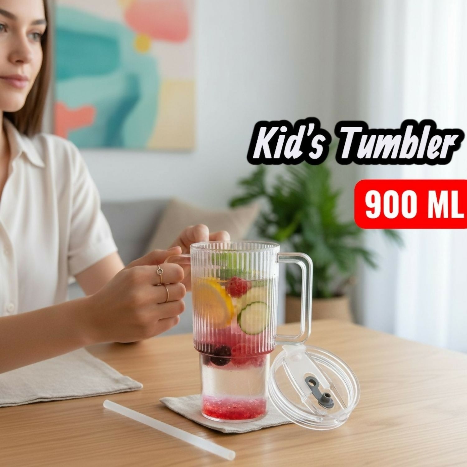Side view of glass tumbler showing ribbed design and handle