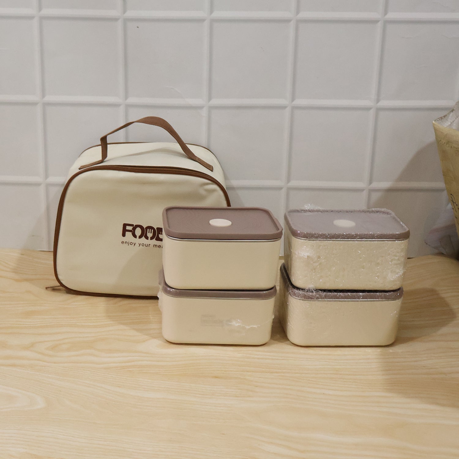 Insulated tiffin lunch box set being used in a daily setting, highlighting convenience.