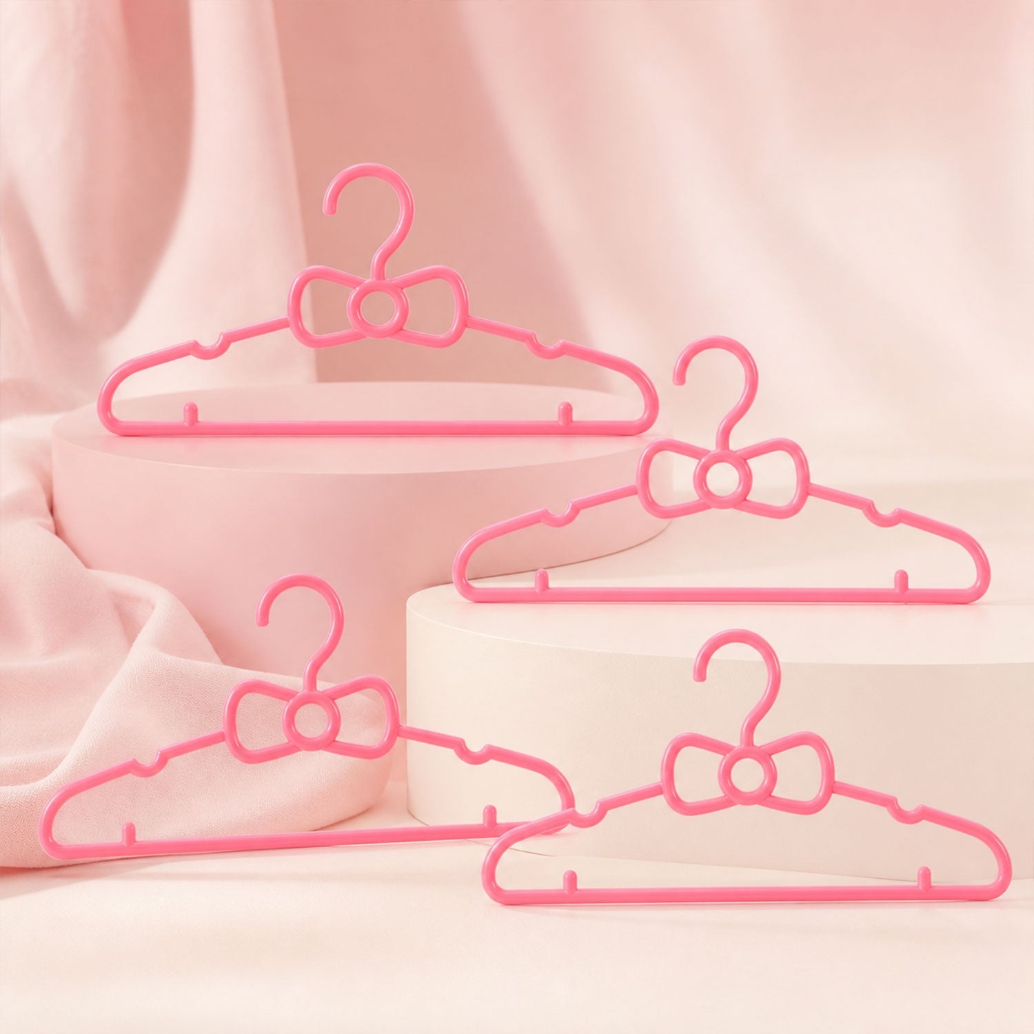 Children's wardrobe hangers with bow detail for small garments