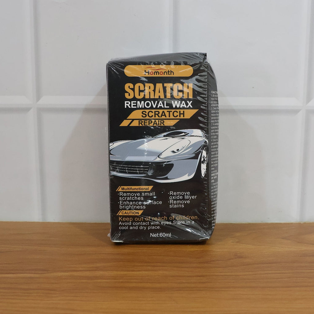 Comparison of car surface before and after using scratch removal wax