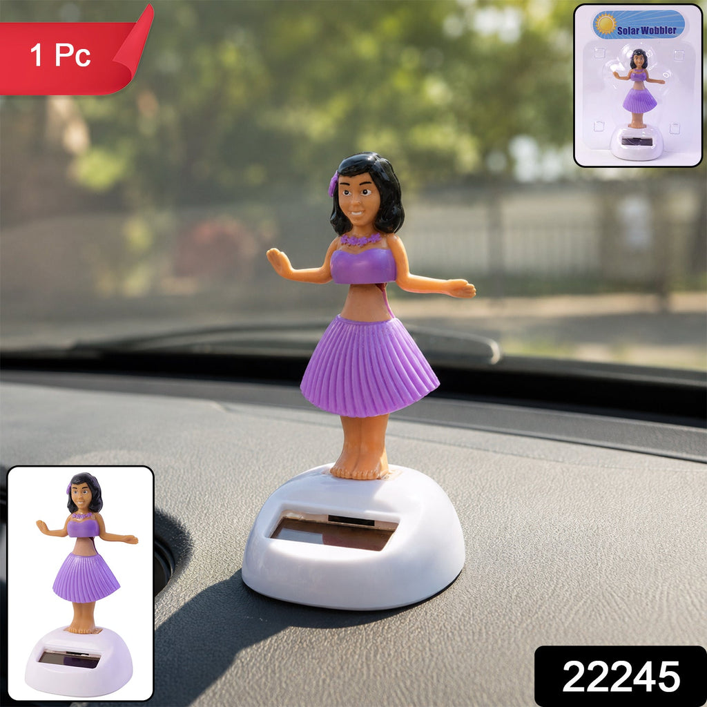 Solar bobble hula doll that dances in sunlight for car dashboards