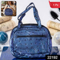 Mini zipper handbag blue ostrich pattern
