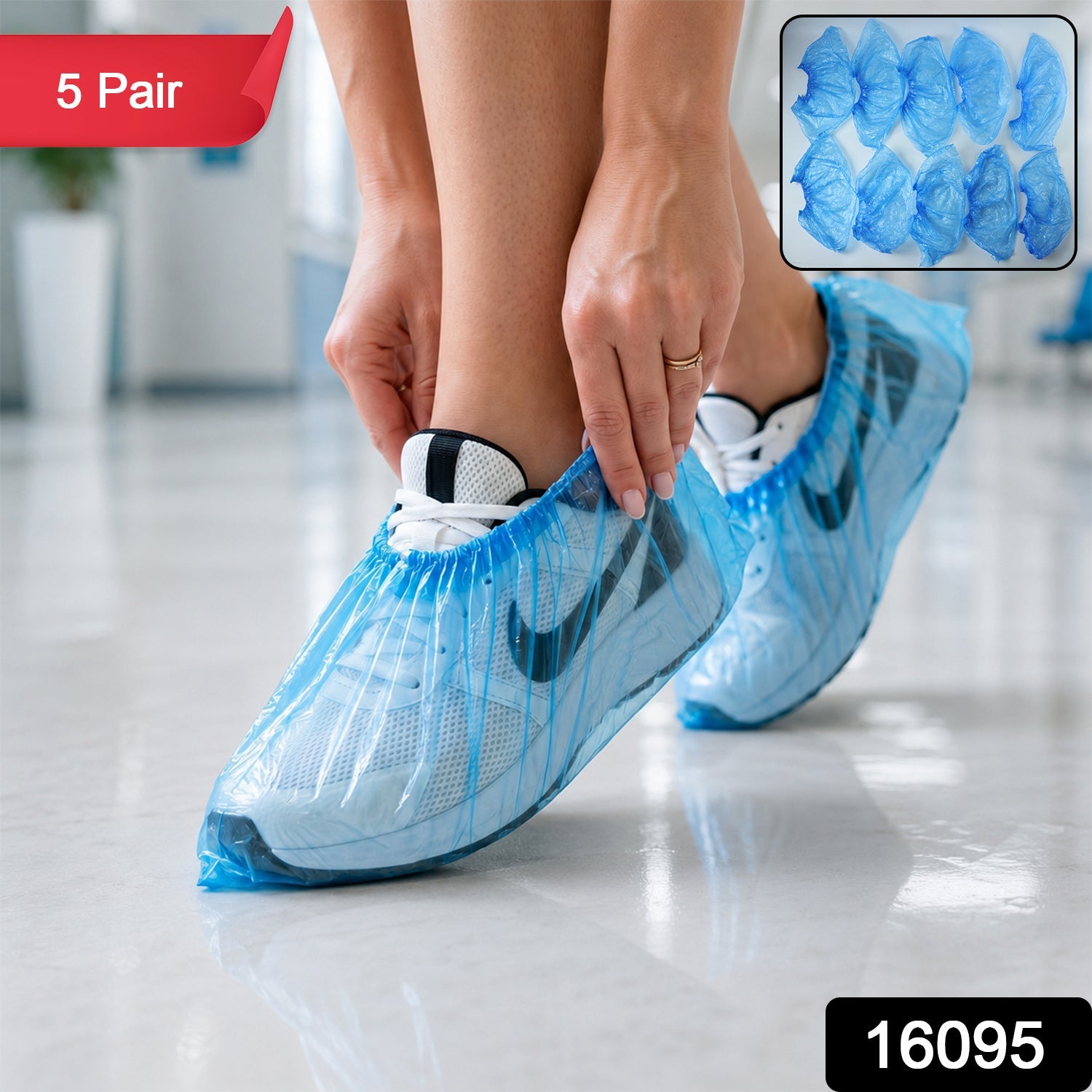 Blue disposable plastic shoe covers with elastic fit for shoes
