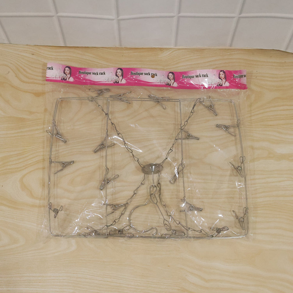 Foldable multi clip hanger for socks, bibs and handkerchiefs